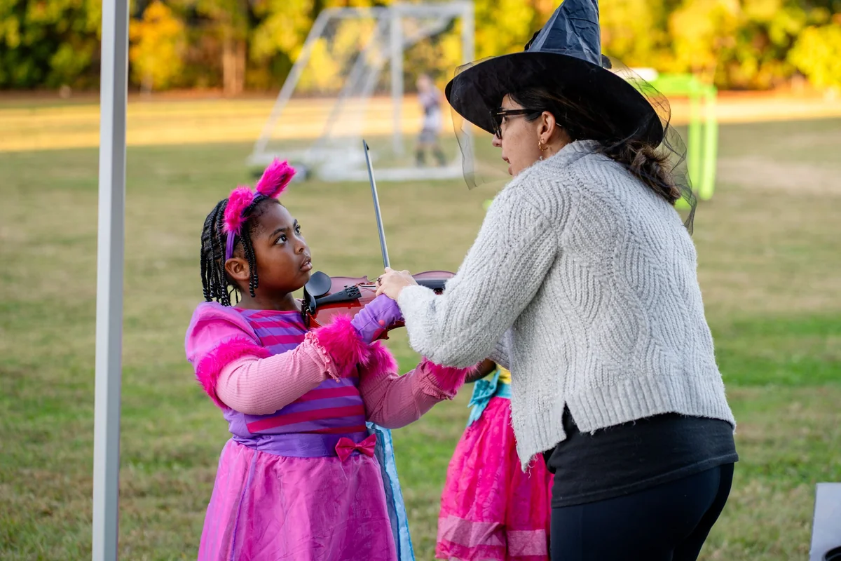 Families attending a Savannah Philharmonic neighborhood concert